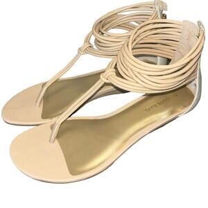 Obsession Rules Camille women’s nude/white thong strappy zip sandals (size 8.5)